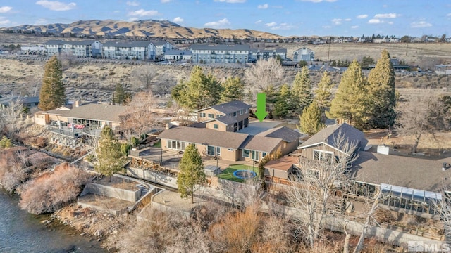 bird's eye view with a mountain view