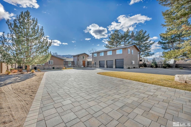 view of front of home with a garage