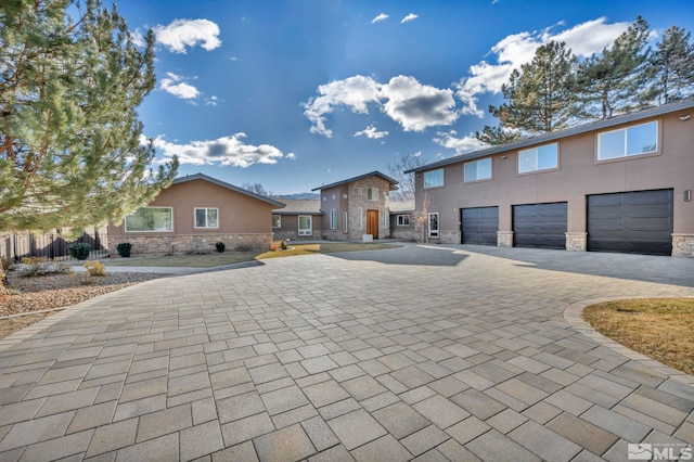 view of front of property with a garage