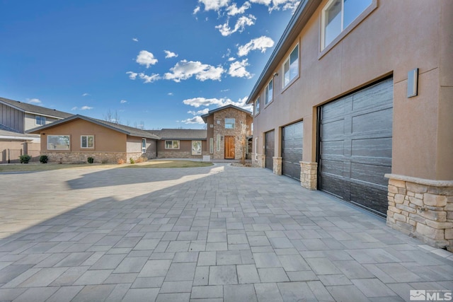 exterior space with a garage