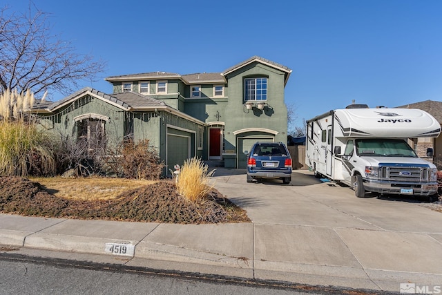 view of front of property with a garage