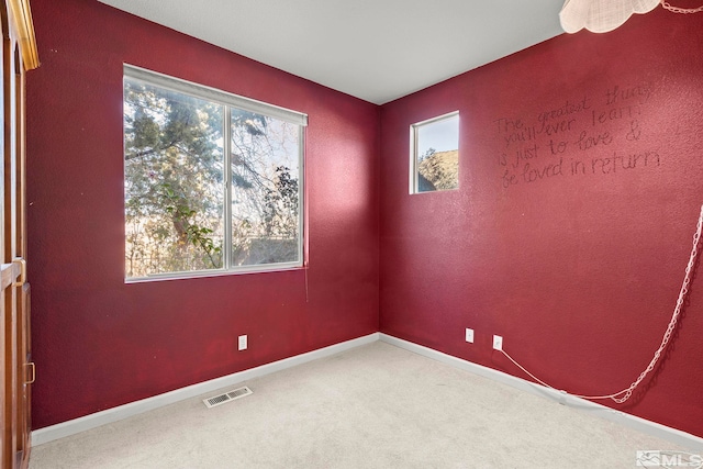 spare room with carpet flooring