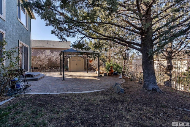 view of yard featuring a gazebo and a patio