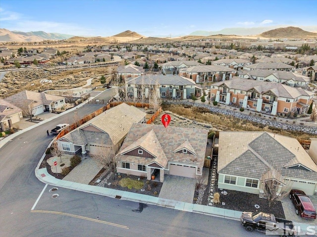 bird's eye view with a mountain view