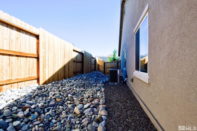 view of yard featuring central AC