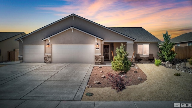 view of front of property with a garage