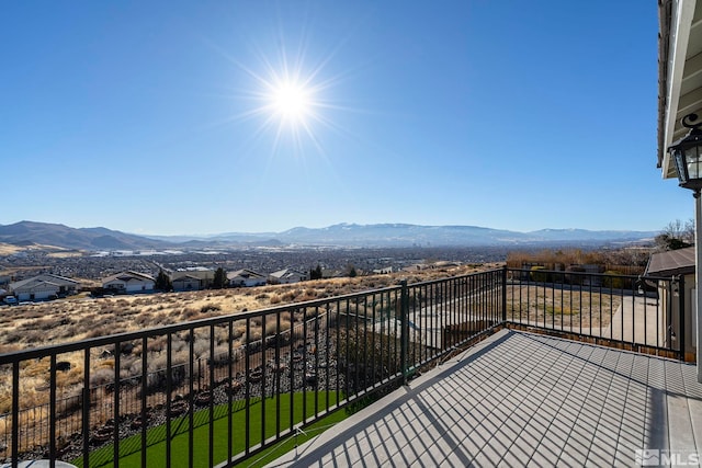 balcony featuring a mountain view