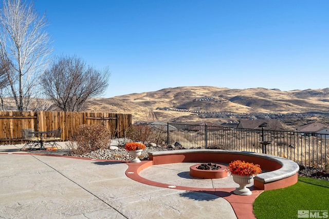 view of patio with a mountain view