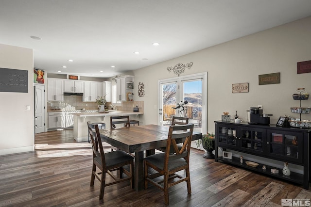 dining room featuring dark hardwood / wood-style floors