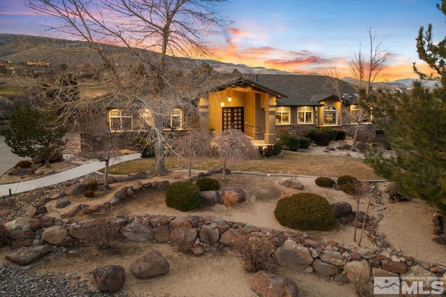 view of front of property featuring a mountain view