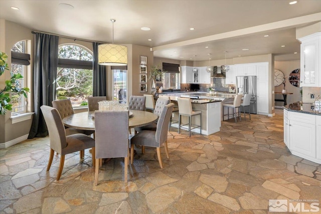 dining space featuring sink