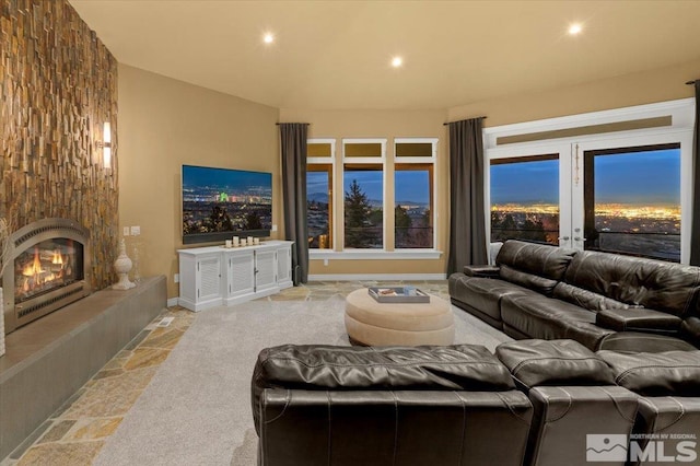 living room featuring a fireplace