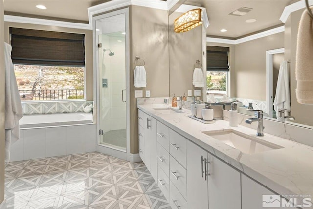 bathroom with vanity, independent shower and bath, and crown molding