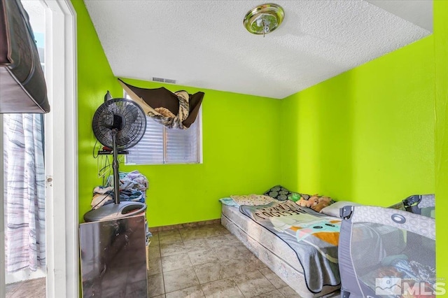 bedroom with a textured ceiling