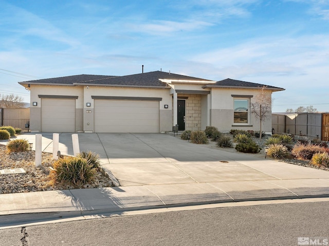 view of front of home with a garage