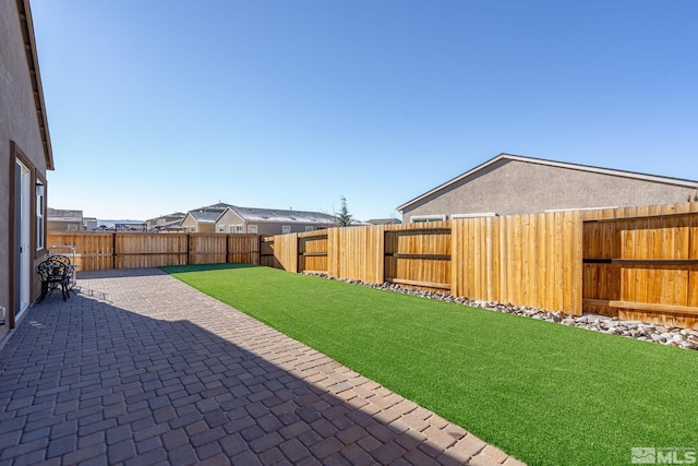 view of yard featuring a patio