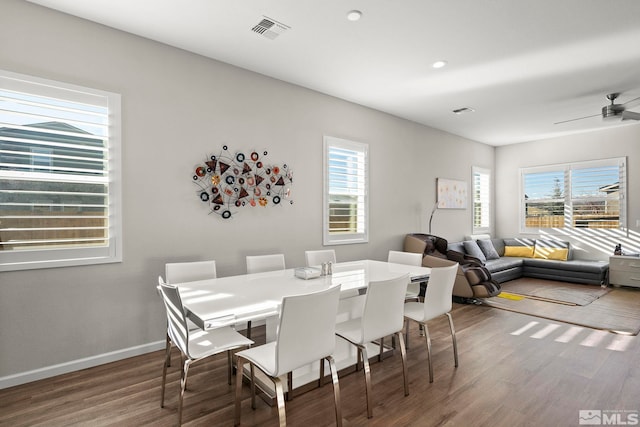 dining room featuring ceiling fan and hardwood / wood-style flooring