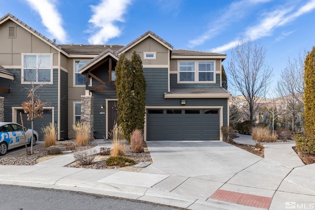 view of front of property featuring a garage