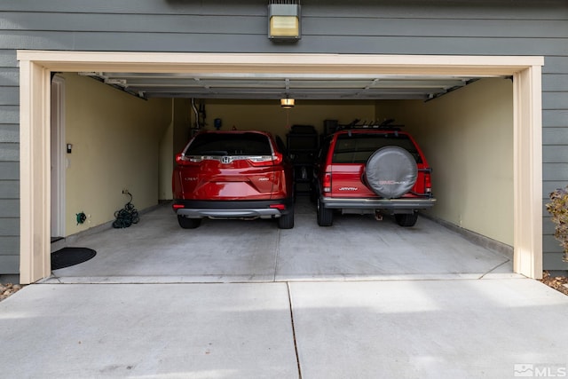 garage featuring a garage door opener