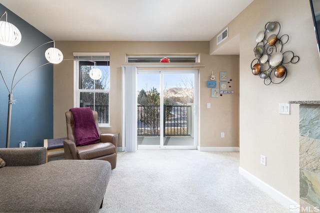 living area with carpet