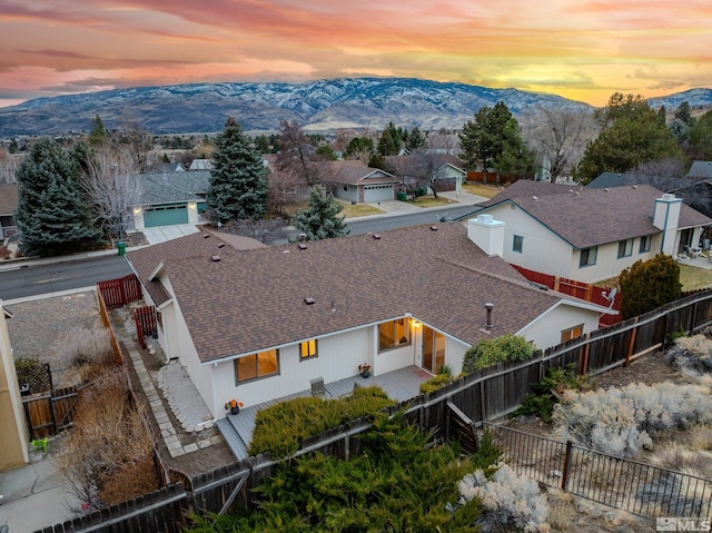 aerial view at dusk with a mountain view