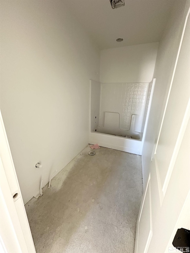 bathroom featuring concrete floors