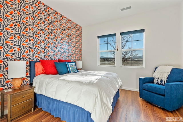 bedroom featuring wood-type flooring