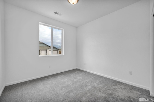 empty room featuring carpet