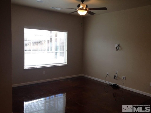 unfurnished room featuring ceiling fan