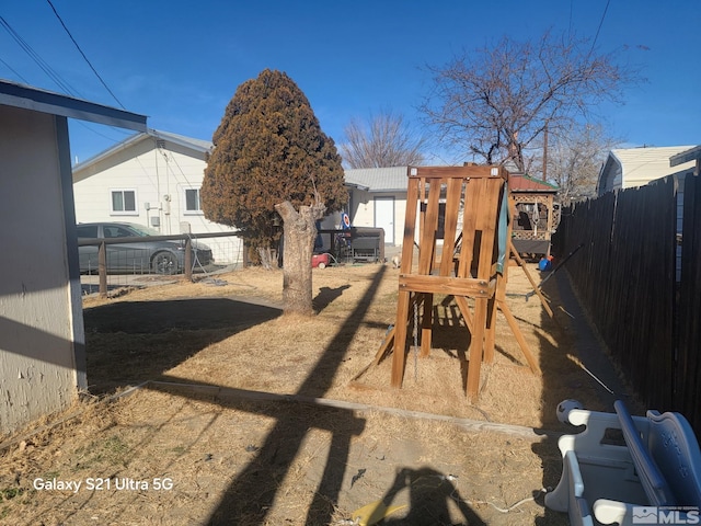 view of yard featuring a playground