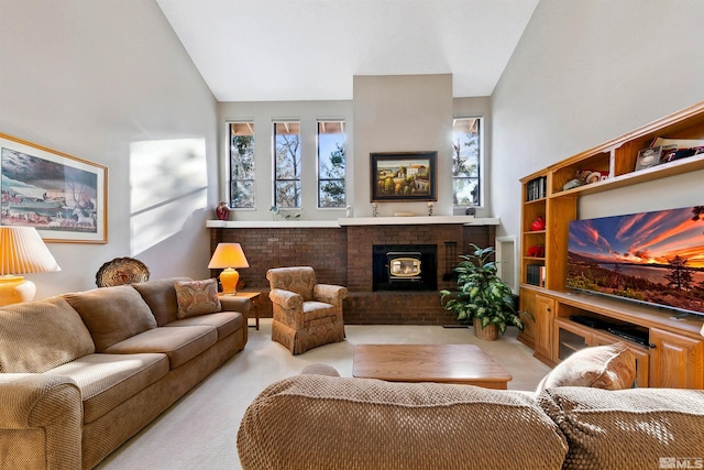 carpeted living room with lofted ceiling