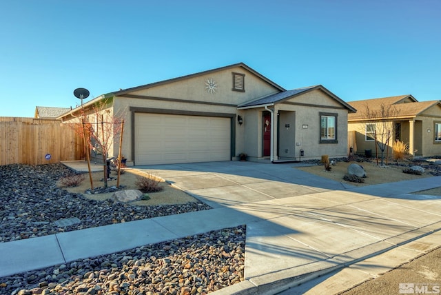 ranch-style home with a garage