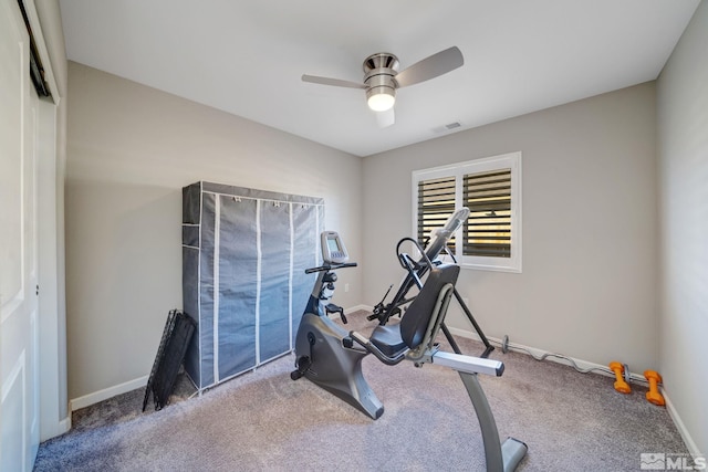 exercise area featuring carpet floors and ceiling fan