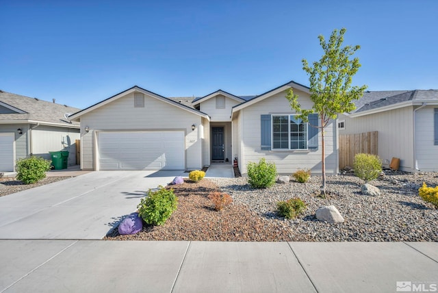 ranch-style house featuring a garage