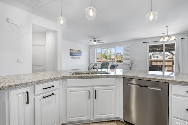 kitchen with dishwasher, ceiling fan with notable chandelier, white cabinets, and sink