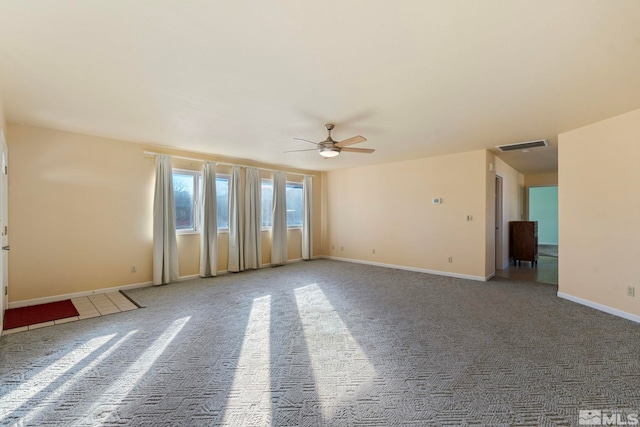 empty room with carpet and ceiling fan