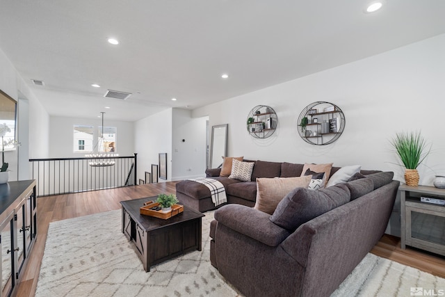 living room with light hardwood / wood-style floors