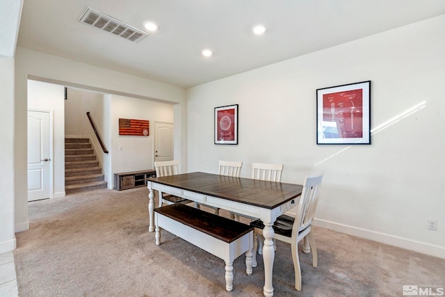 dining area with light carpet