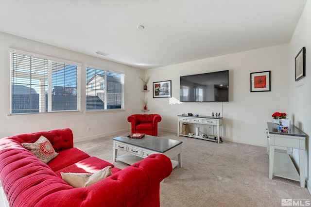 living room with light colored carpet