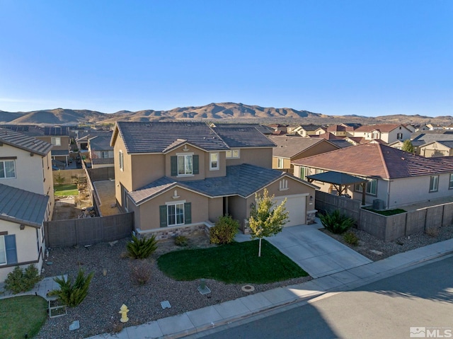 view of front of home with a mountain view