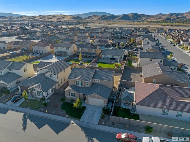 drone / aerial view featuring a mountain view