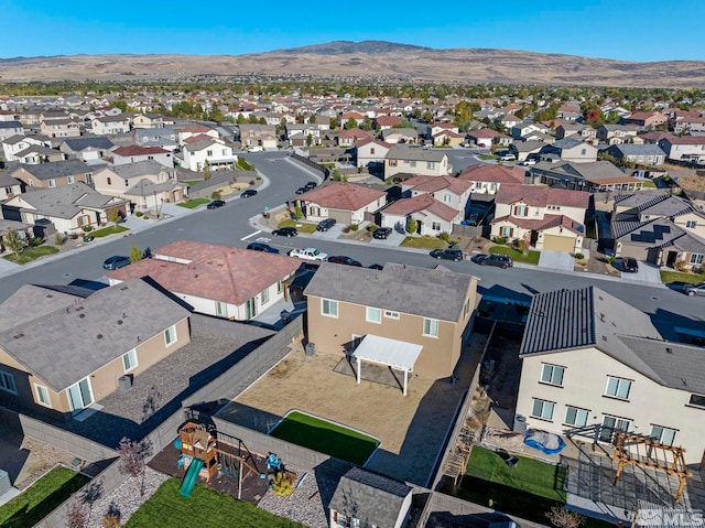 bird's eye view with a mountain view