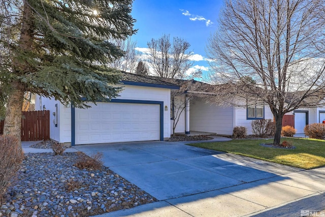 single story home with a front lawn and a garage