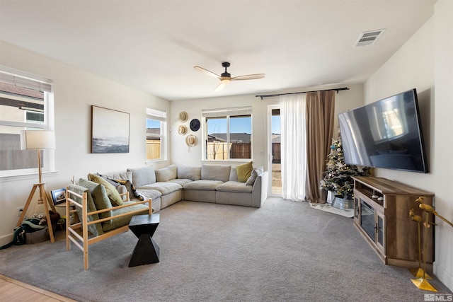 living room featuring ceiling fan