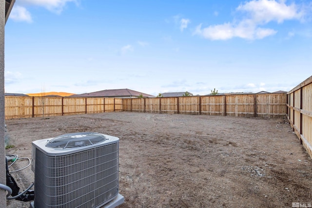 view of yard with central air condition unit