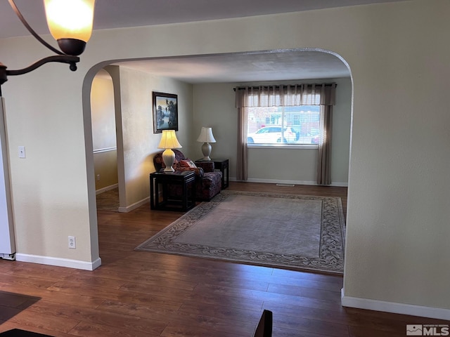 foyer entrance featuring dark hardwood / wood-style floors