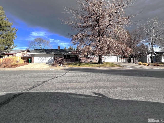 view of front of property with a garage