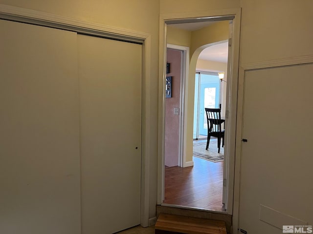 corridor featuring hardwood / wood-style flooring