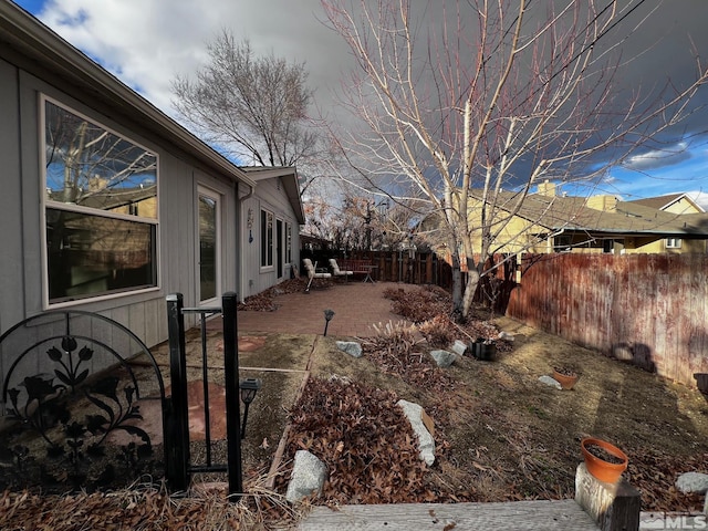 view of yard with a patio area