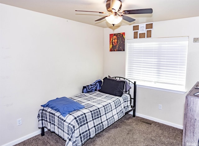 carpeted bedroom with ceiling fan